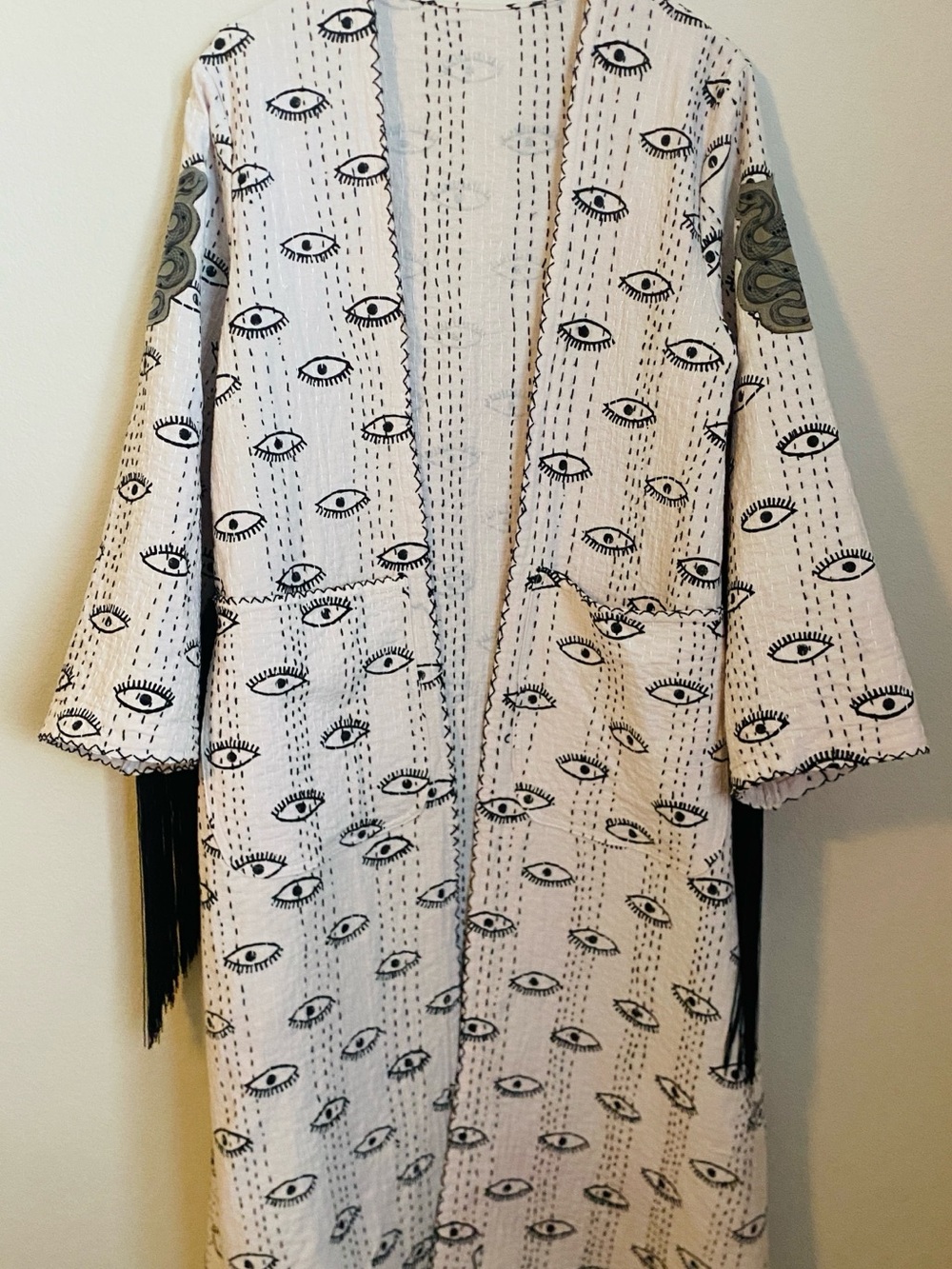 Handmade block printed eye kimono, Snake and fringe detail